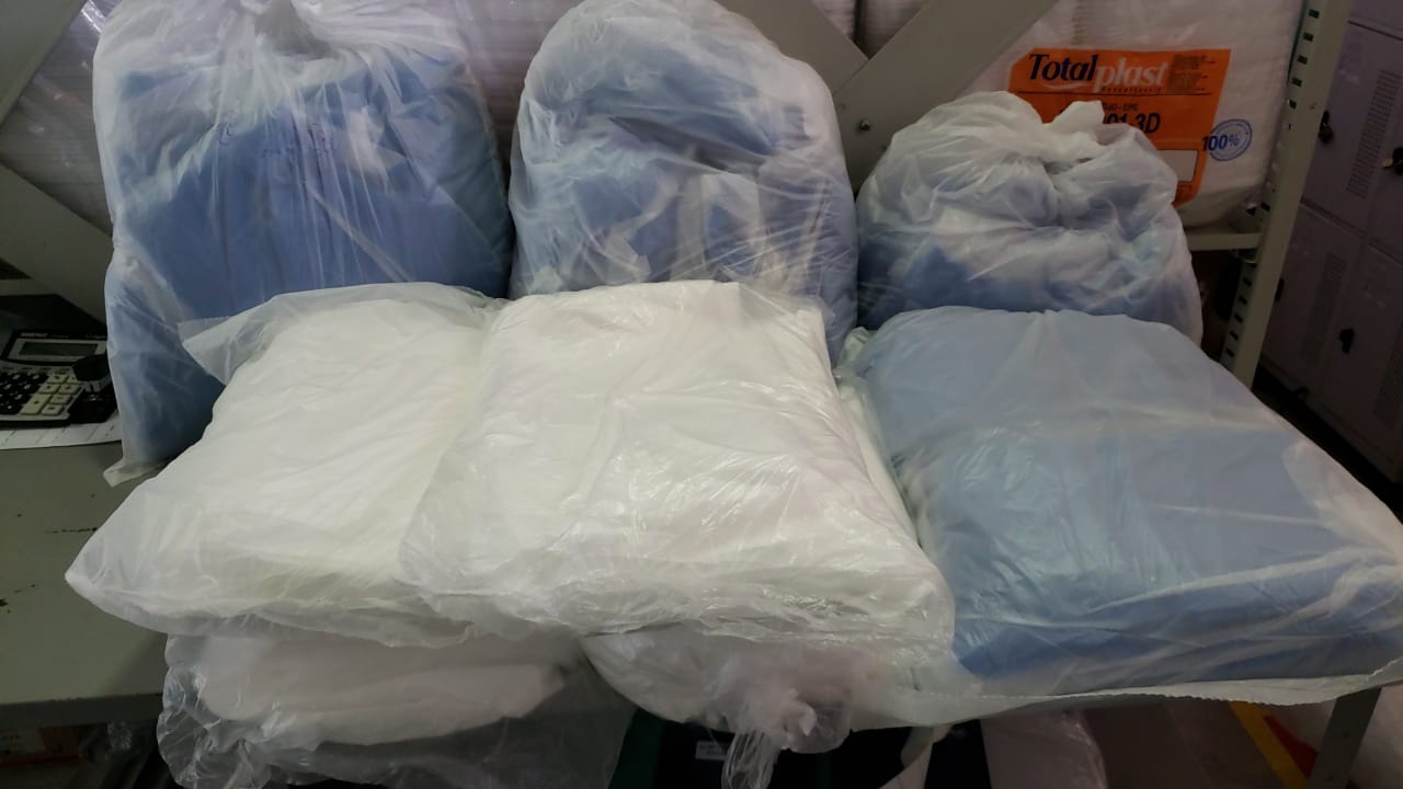 Doação de capotes para instituição